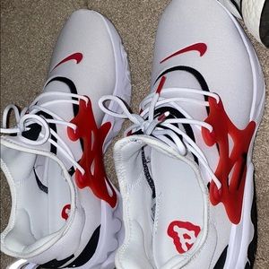 Red and white Nike prestos